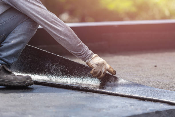 Professional Waterproofing technician working in Roanoke, IL